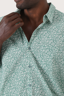 Close-up fabric and collar detail of the Panta Cotton Shirt Summer Flora Spring Bliss Green by By The Sea Bali