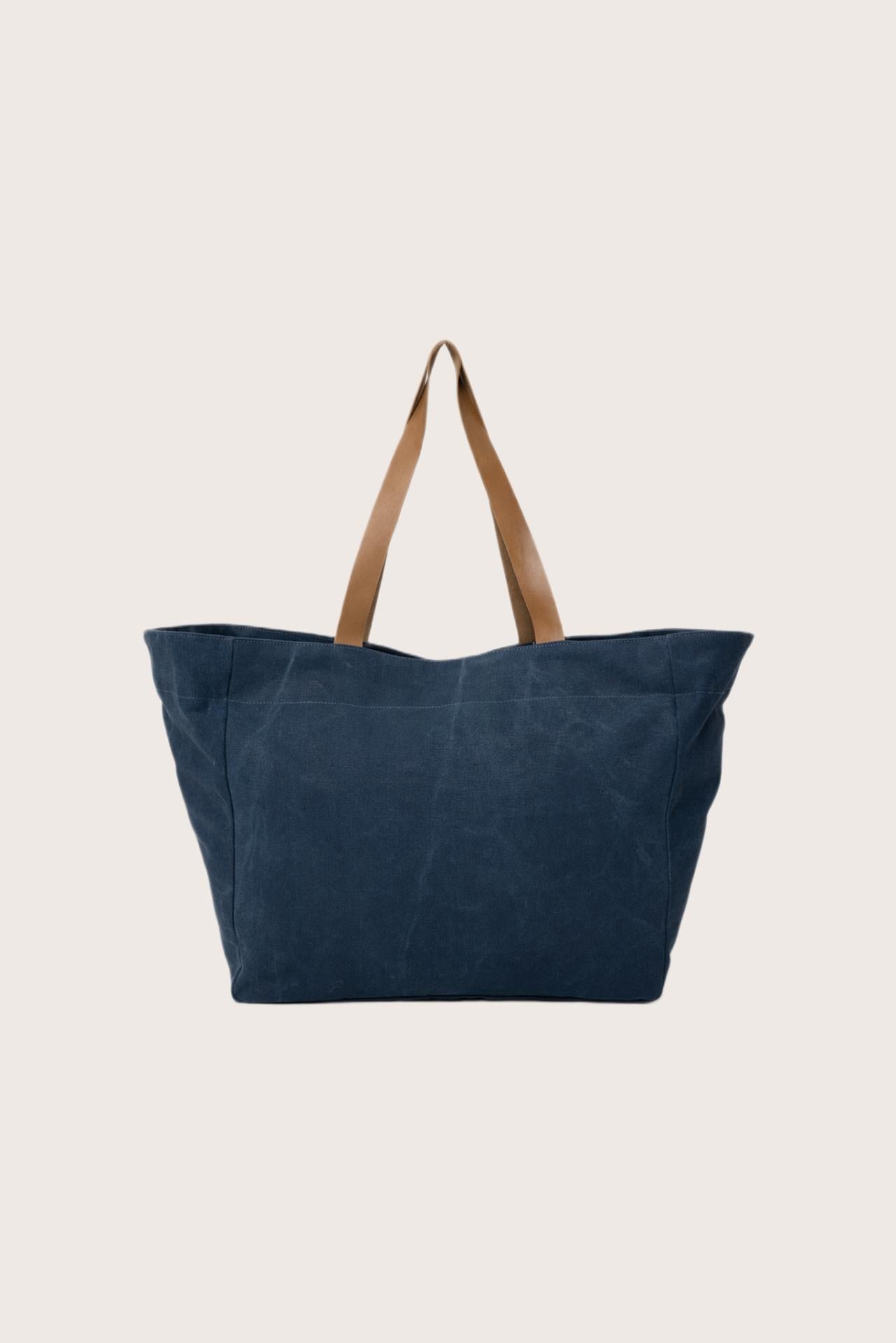 Back view of the navy Paradise tote bag