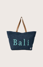 Navy Paradise tote bag by By The Sea Bali displayed from the front