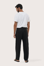 Full length view of the Parha Black Linen Pant — men's relaxed summer style by By The Sea Bali