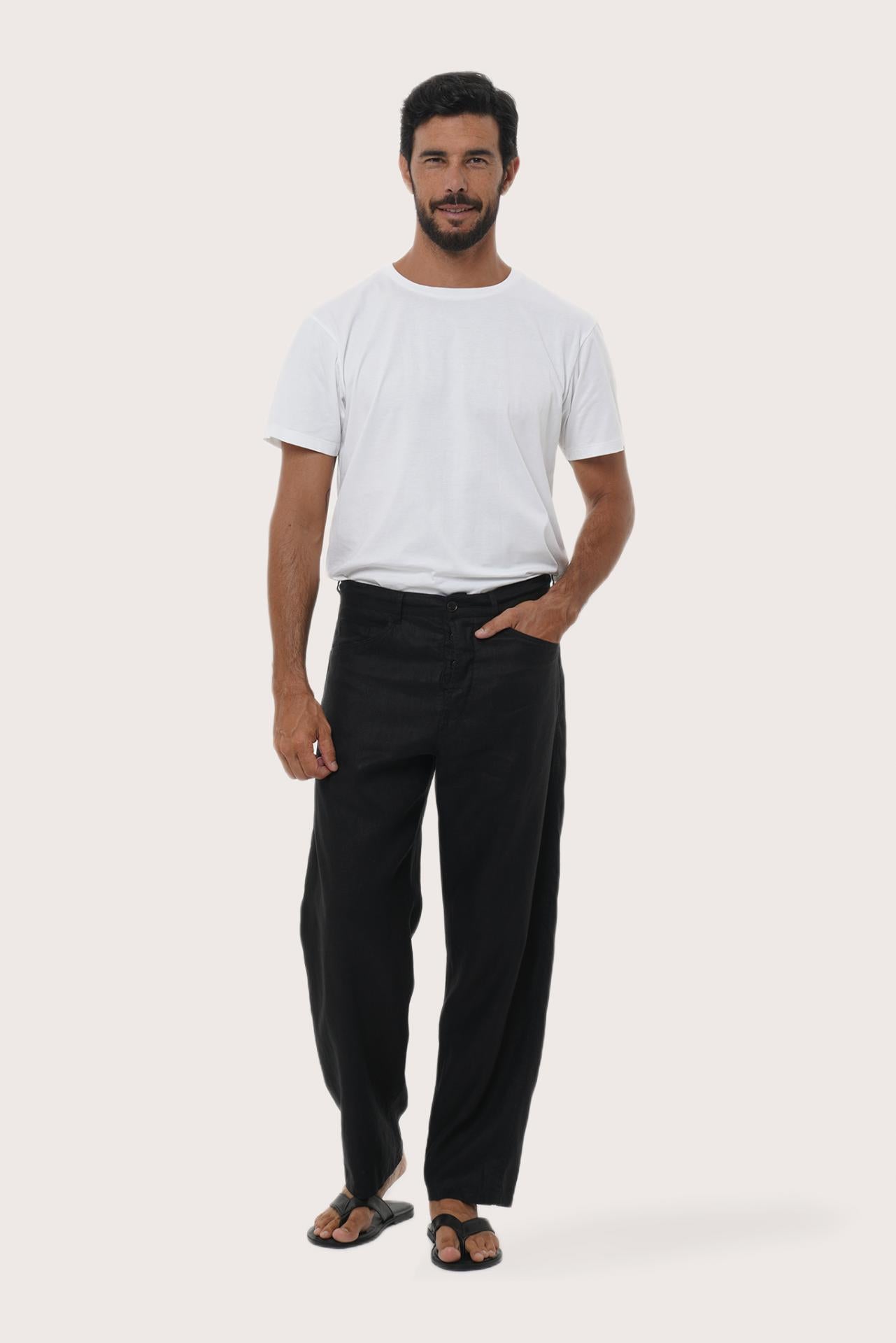 Side view of the Parha Linen Pant in Black by By The Sea Bali