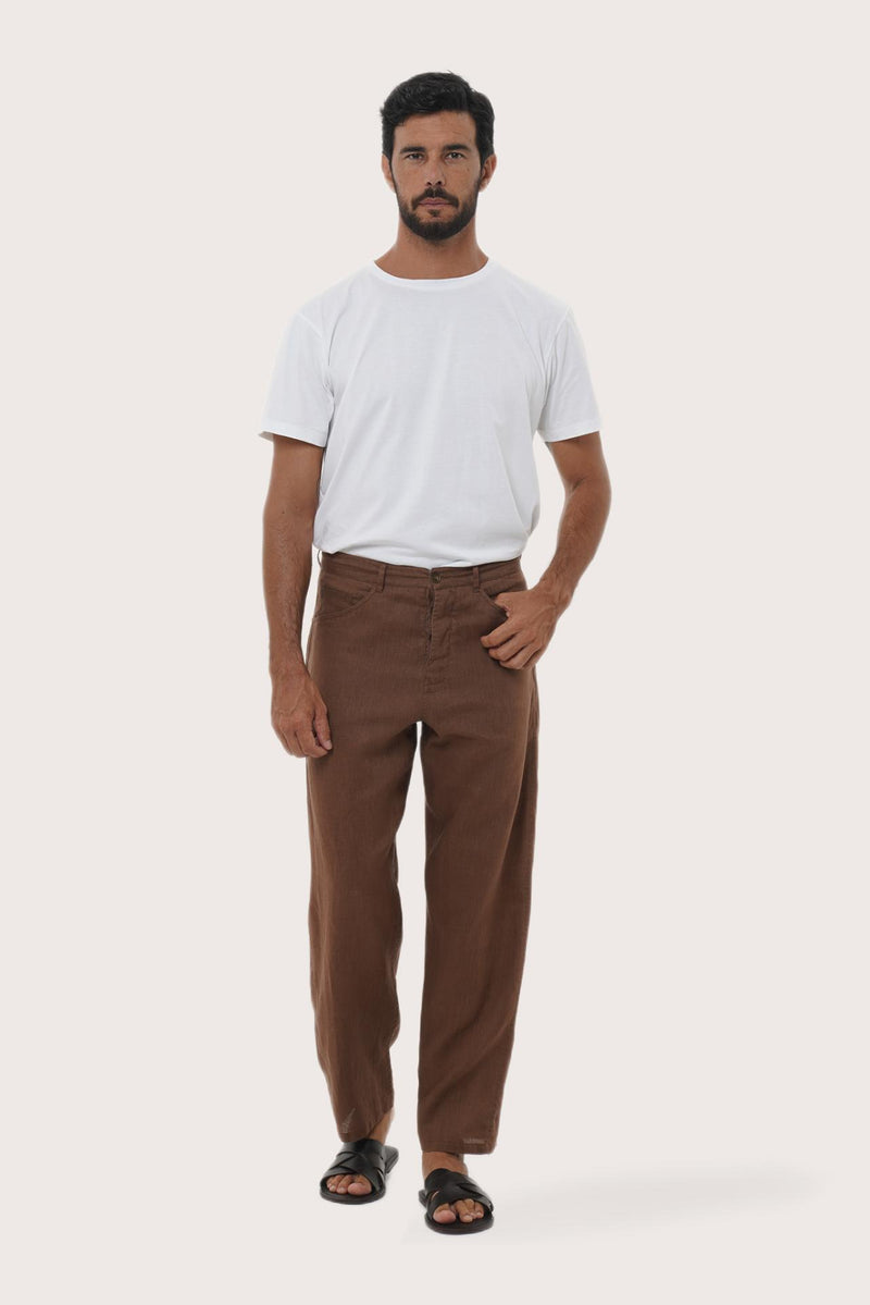 By The Sea Bali Parha Linen Pant in Brown — a relaxed, loose-fit pure linen trouser with signature back pocket detailing