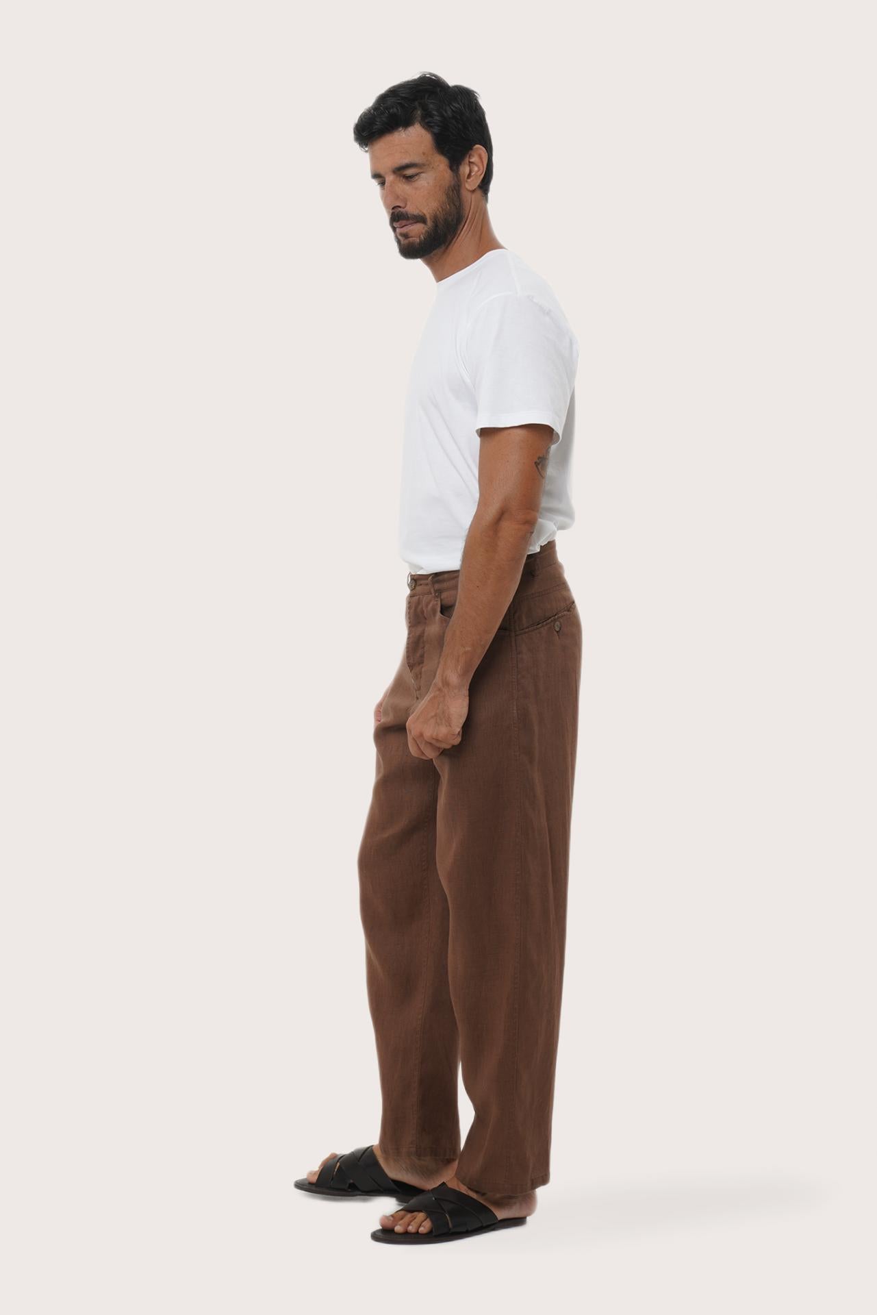 Side profile of the Parha Linen Pant in Brown by By The Sea Bali, tailored in breathable 100% linen