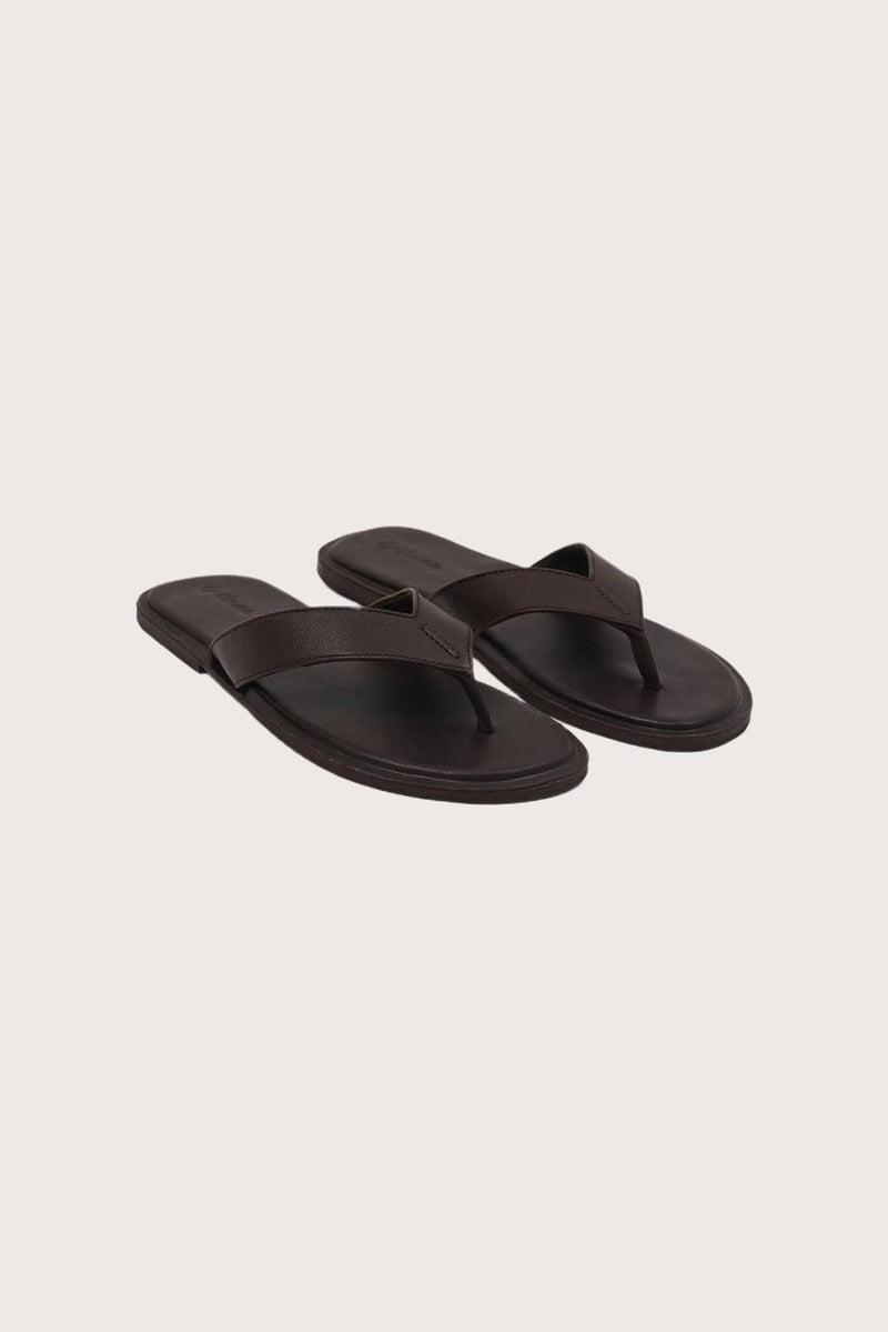 Paros leather sandals in marrone front view showcasing elegant leather straps and minimalist resort aesthetic