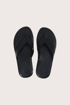 Paros leather sandals in nero shown in a global view highlighting their full silhouette and refined resort design