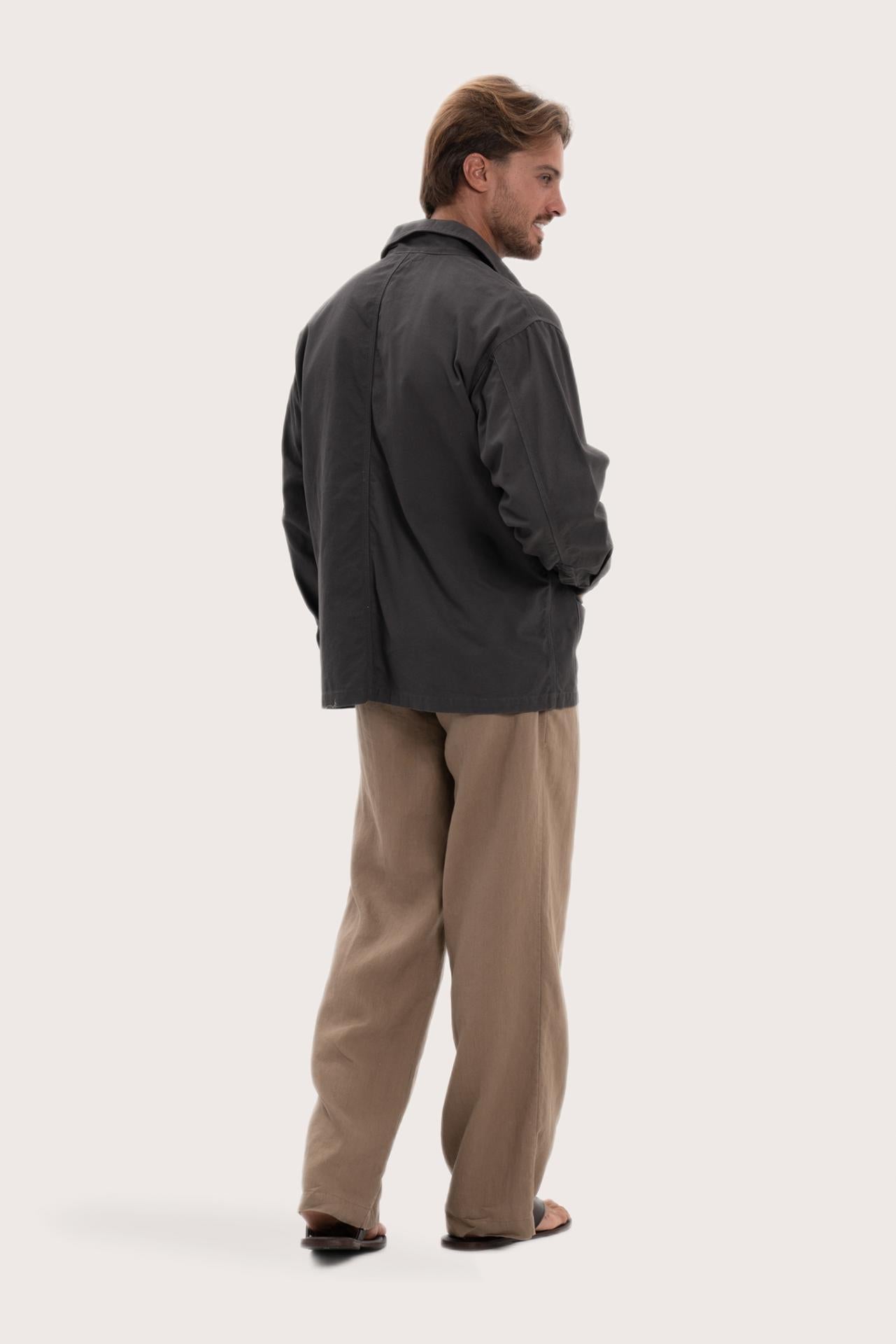 Back view of the dark brown cotton jacket with a relaxed and contemporary silhouette