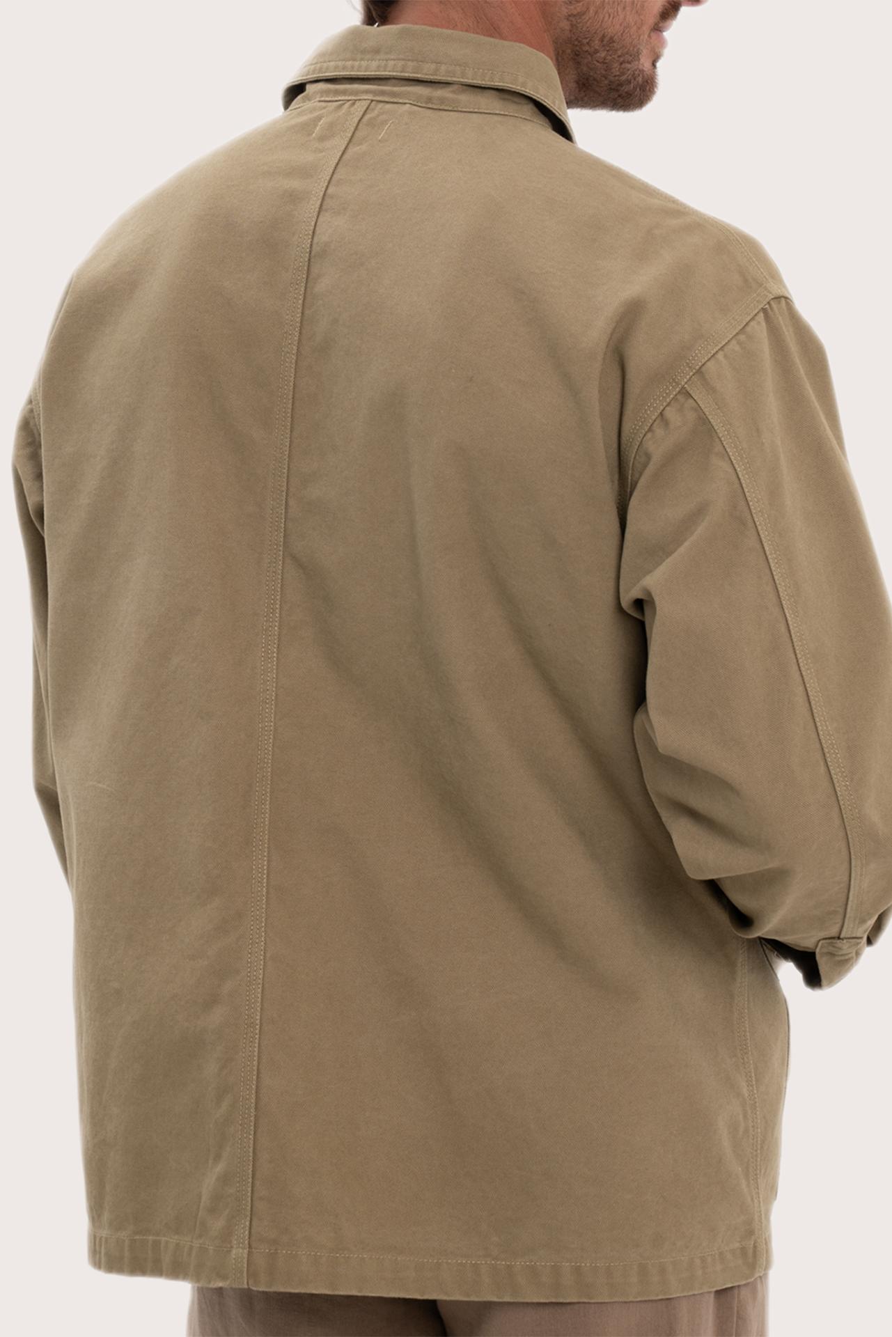 Detailed back view highlighting the relaxed silhouette and cotton craftsmanship
