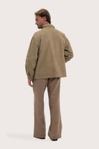 Back view of the khaki cotton jacket with a relaxed and contemporary silhouette