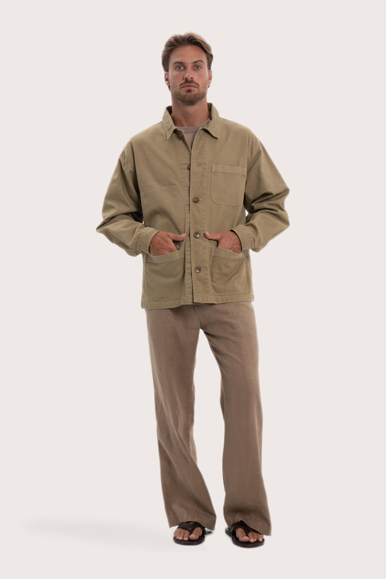 Model wearing the khaki cotton Parth jacket by By The Sea Bali