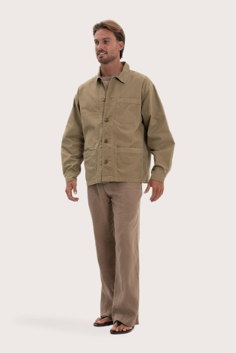 Side profile of the khaki cotton jacket showcasing its comfortable fit and clean lines