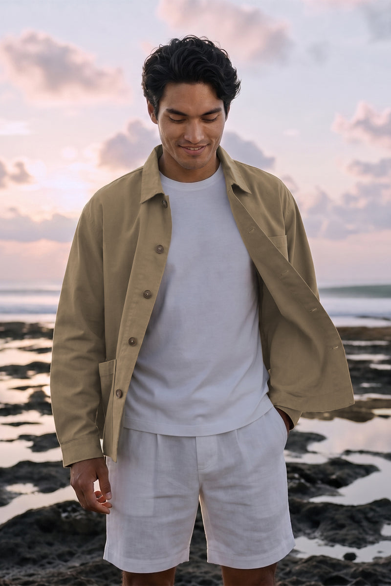 Men wearing By the sea jacket on the white T-shirt and white Liinen shorts in the beach in Bali  pererenan