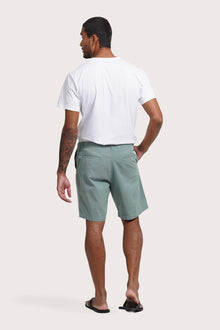 Back view of the sage bermuda shorts with a relaxed and tailored silhouette