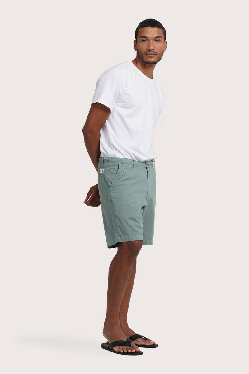Side profile of the sage bermuda shorts showcasing their effortless fit