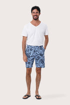 Front view of the Paulo Bermuda Shorts in Little Palm Light Blue print by By The Sea Bali
