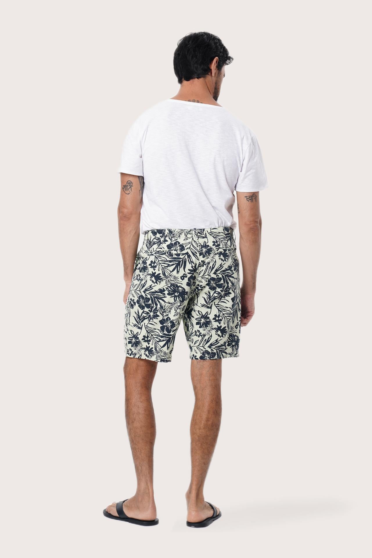 Side view of the Paulo Bermuda Shorts in Little Palm Light Green highlighting the tailored fit by By The Sea Bali
