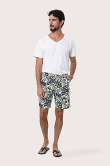 Front view of the Paulo Bermuda Shorts in Little Palm Light Green print by By The Sea Bali