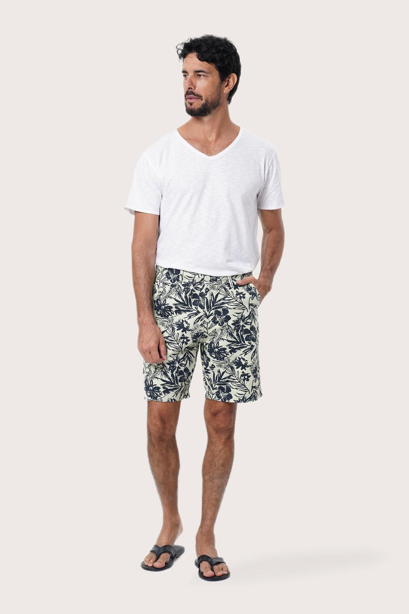 Front view of the Paulo Bermuda Shorts in Little Palm Light Green print by By The Sea Bali