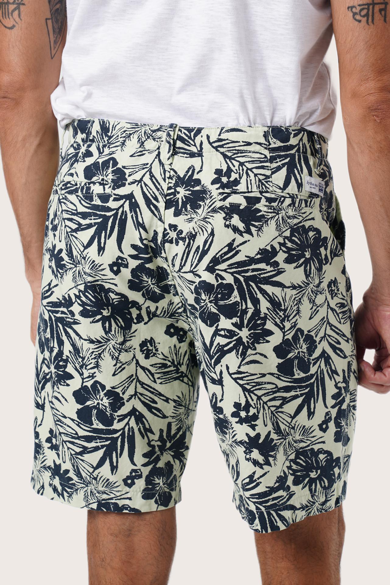 Men's resortwear styling featuring the Paulo Bermuda Shorts in Little Palm Light Green by By The Sea Bali