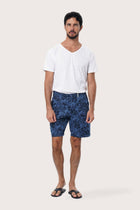 Front view of the Paulo Bermuda Shorts in Little Palm Navy print by By The Sea Bali