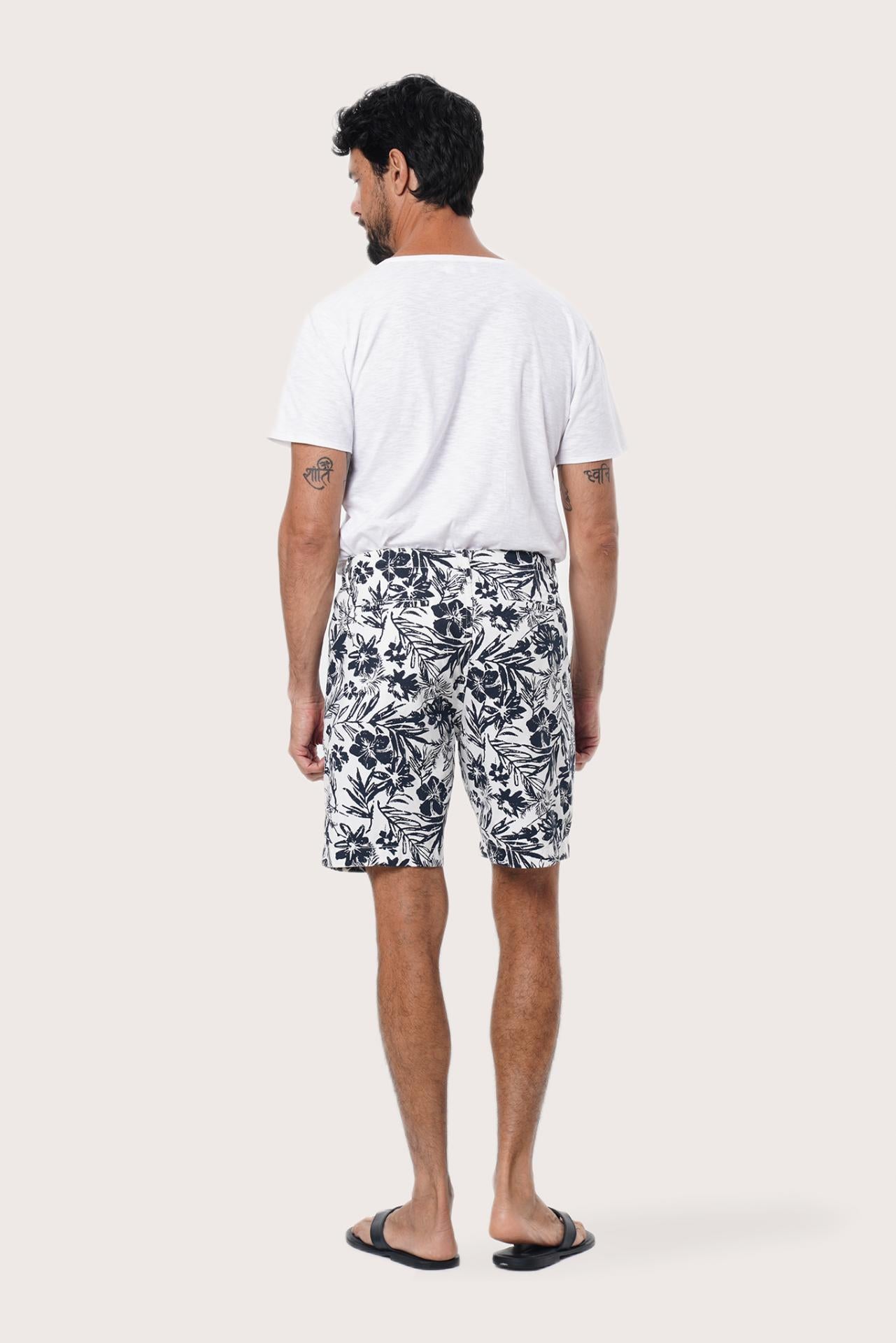 Front view of the Paulo Bermuda Shorts in Little Palm White print by By The Sea Bali