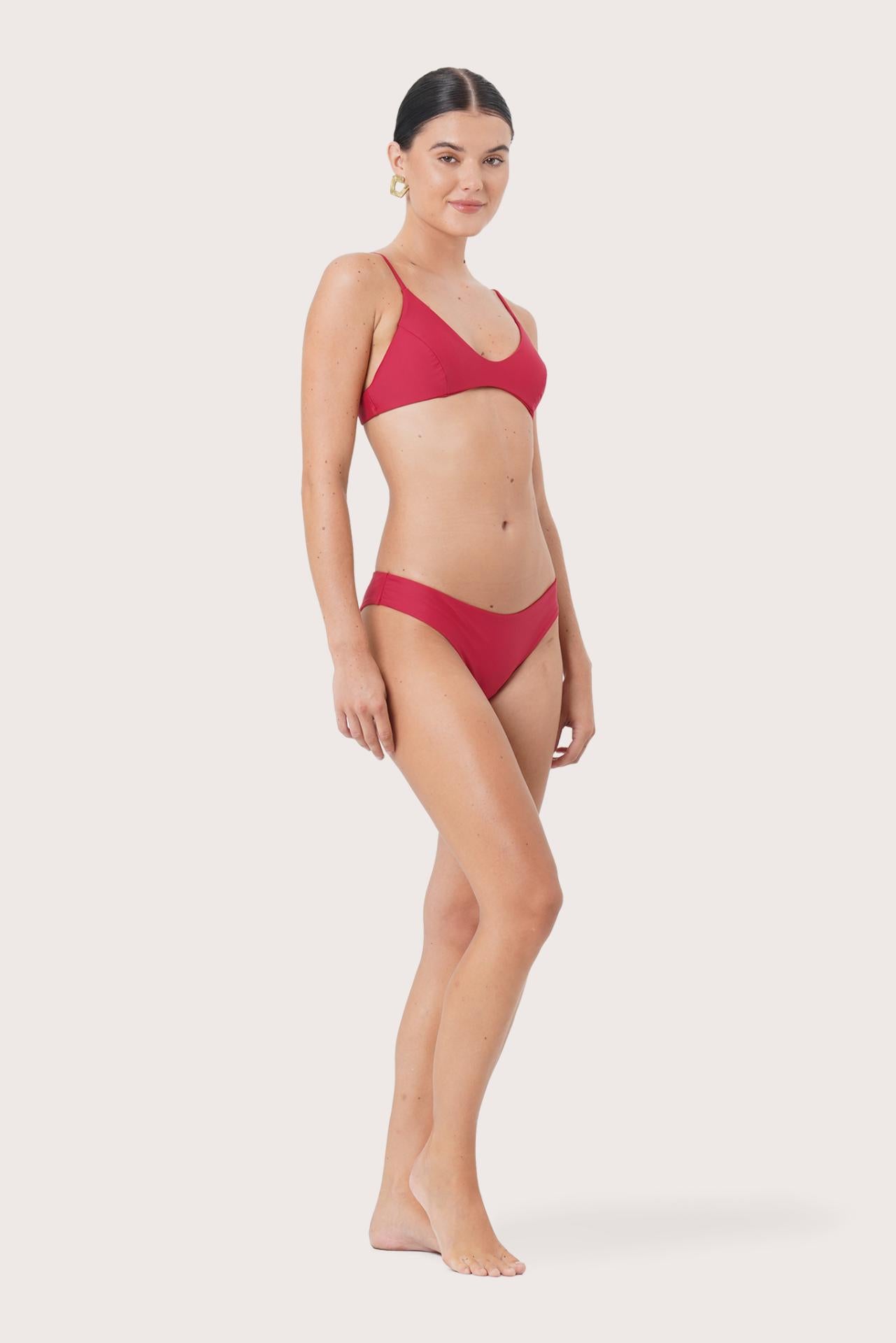 Model wearing Pearl Bikini Bottom styled for luxury resort and beachwear