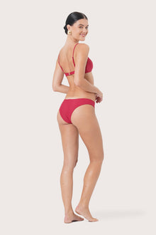 Side view of Pearl Bikini Bottom highlighting its sleek and feminine profile