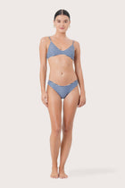 Front view of Pearl Bikini Top Stripes Strauv featuring an elegant striped swimwear silhouette