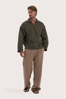 Model wearing the dark brown cotton Pescador outerwear by By The Sea Bali