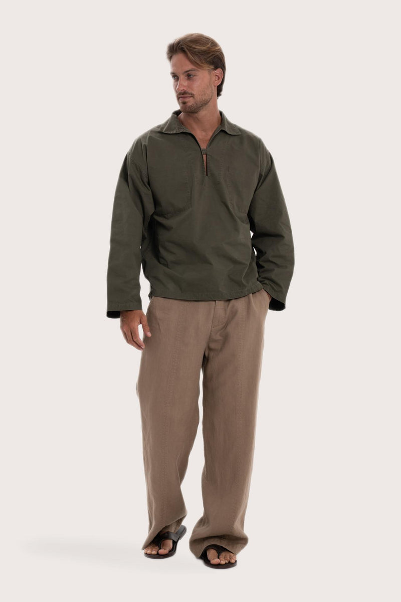 Model wearing the dark brown cotton Pescador outerwear by By The Sea Bali