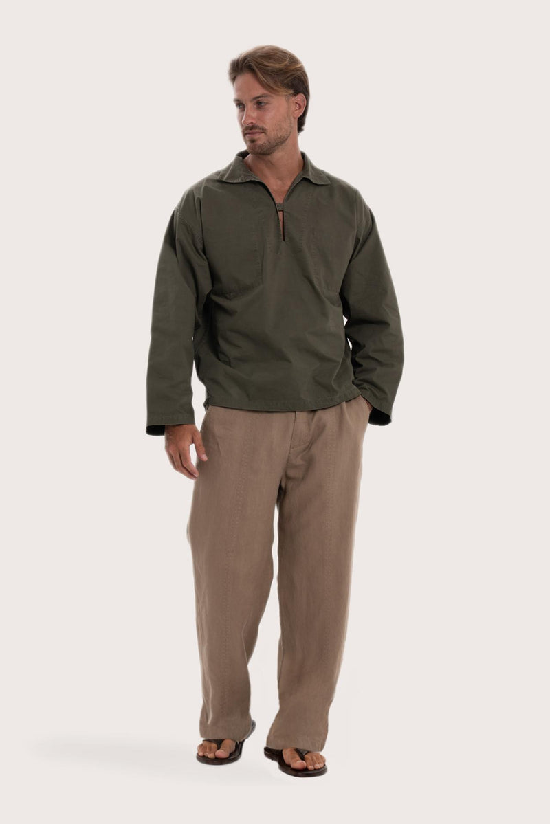 Model wearing the dark brown cotton Pescador outerwear by By The Sea Bali