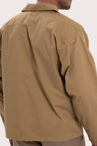 Detailed back view highlighting the relaxed silhouette and cotton craftsmanship