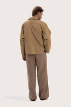 Back view of the light brown cotton outerwear with a relaxed and contemporary silhouette