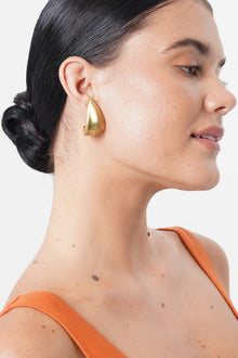Close-up detail of the Petal Earring showcasing artisanal finishing