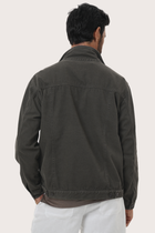 Detailed back view highlighting the relaxed silhouette and cotton craftsmanship