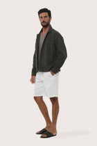 Side profile of the grey brown cotton jacket showcasing its comfortable fit and clean lines