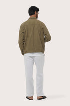 Back view of the greyish brown cotton jacket with a relaxed and contemporary silhouette
