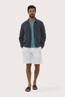 Model wearing the navy cotton Philo jacket by By The Sea Bali