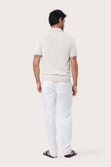 Back view of the By The Sea Bali Rado cream cotton-knit polo shirt in soft textured cotton knit
