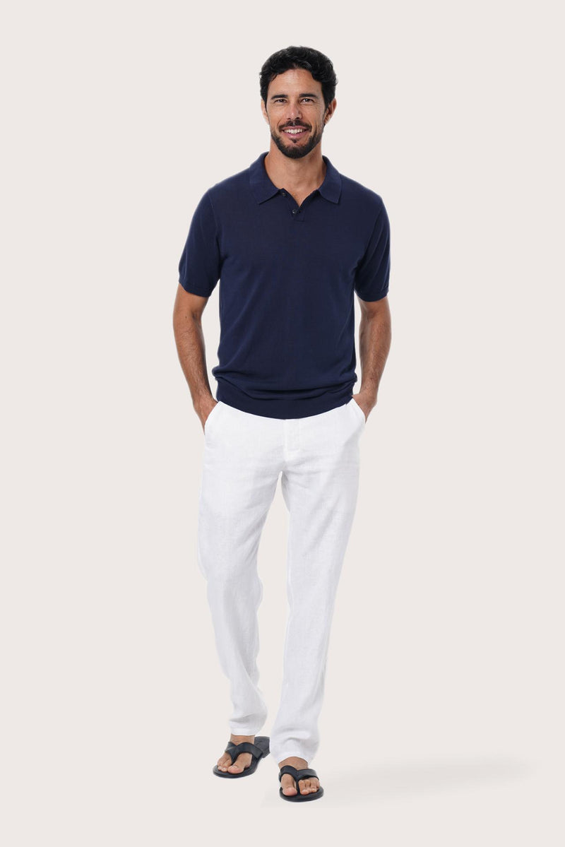 Front view of the By The Sea Bali Rado navy cotton-knit polo shirt with ribbed collar and tonal buttons