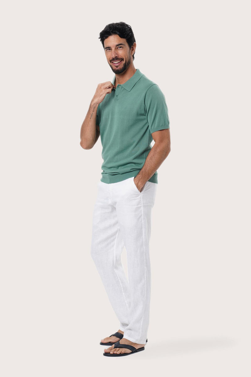 Side profile of the By The Sea Bali Rado sage cotton-knit polo shirt showing its tailored relaxed fit