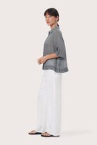 By The Sea Bali Side profile of the Rae Shirt showcasing its relaxed fit and fluid drape
