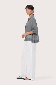 By The Sea Bali Side profile of the Rae Shirt showcasing its relaxed fit and fluid drape