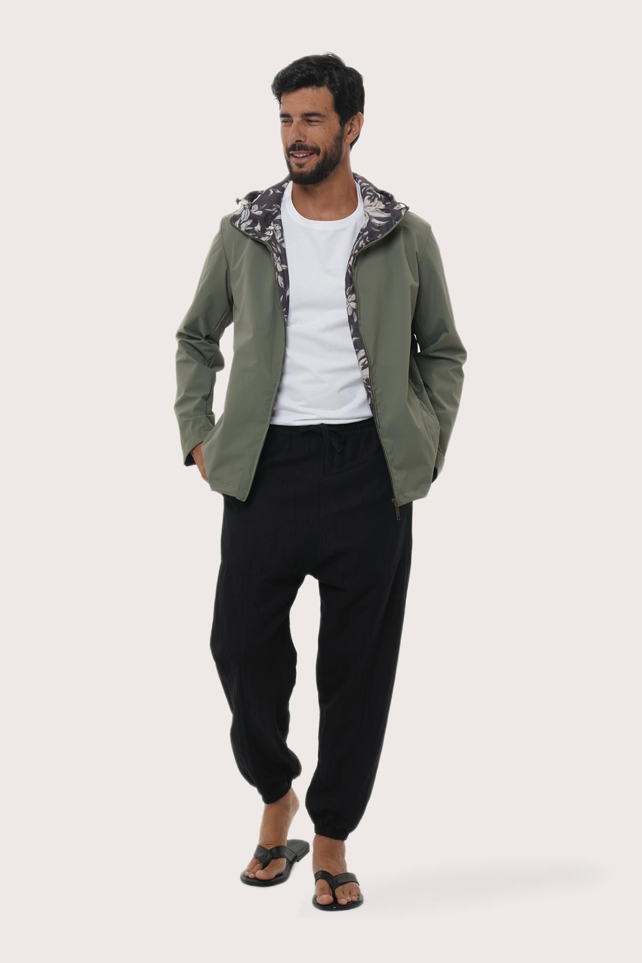 Model wearing the army green Raiga hoodie jacket by By The Sea Bali