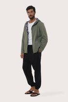 Side profile of the army green hoodie jacket showcasing its comfortable fit and clean lines
