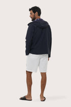 Back view of the navy hoodie jacket with a relaxed and contemporary silhouette