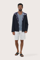 Model wearing the navy Raiga hoodie jacket by By The Sea Bali