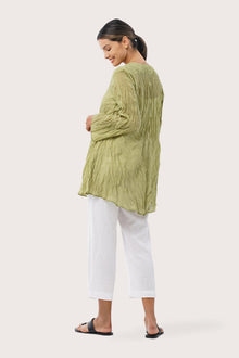 Back view of the Ravenna Cotton Outerwear Blue highlighting the garment shape and drape