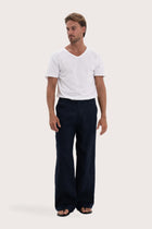 Model wearing the navy linen Rosca pants by By The Sea Bali