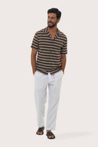 Front view of the Salur Shirt Double Stripe in Brown by By The Sea Bali, styled for effortless summer dressing