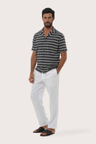 Side profile of the Salur Shirt Double Stripe in Grey Brown highlighting its easy, breathable fit by By The Sea Bali